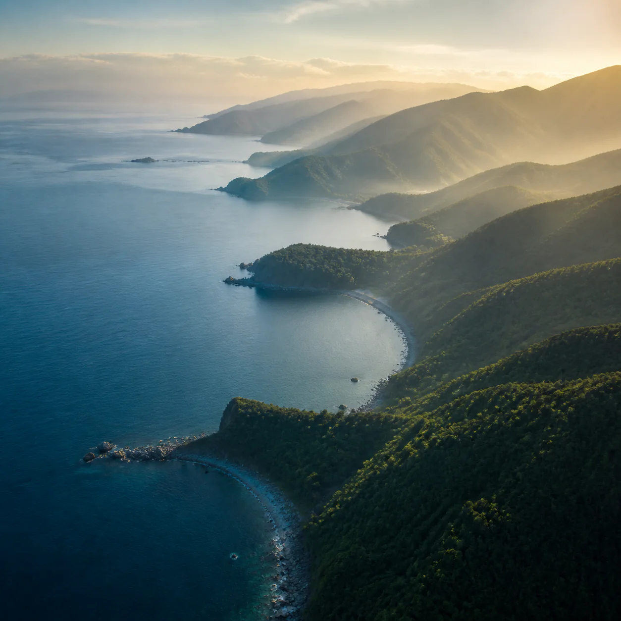 Taiwan coastline illuminated by early morning light.